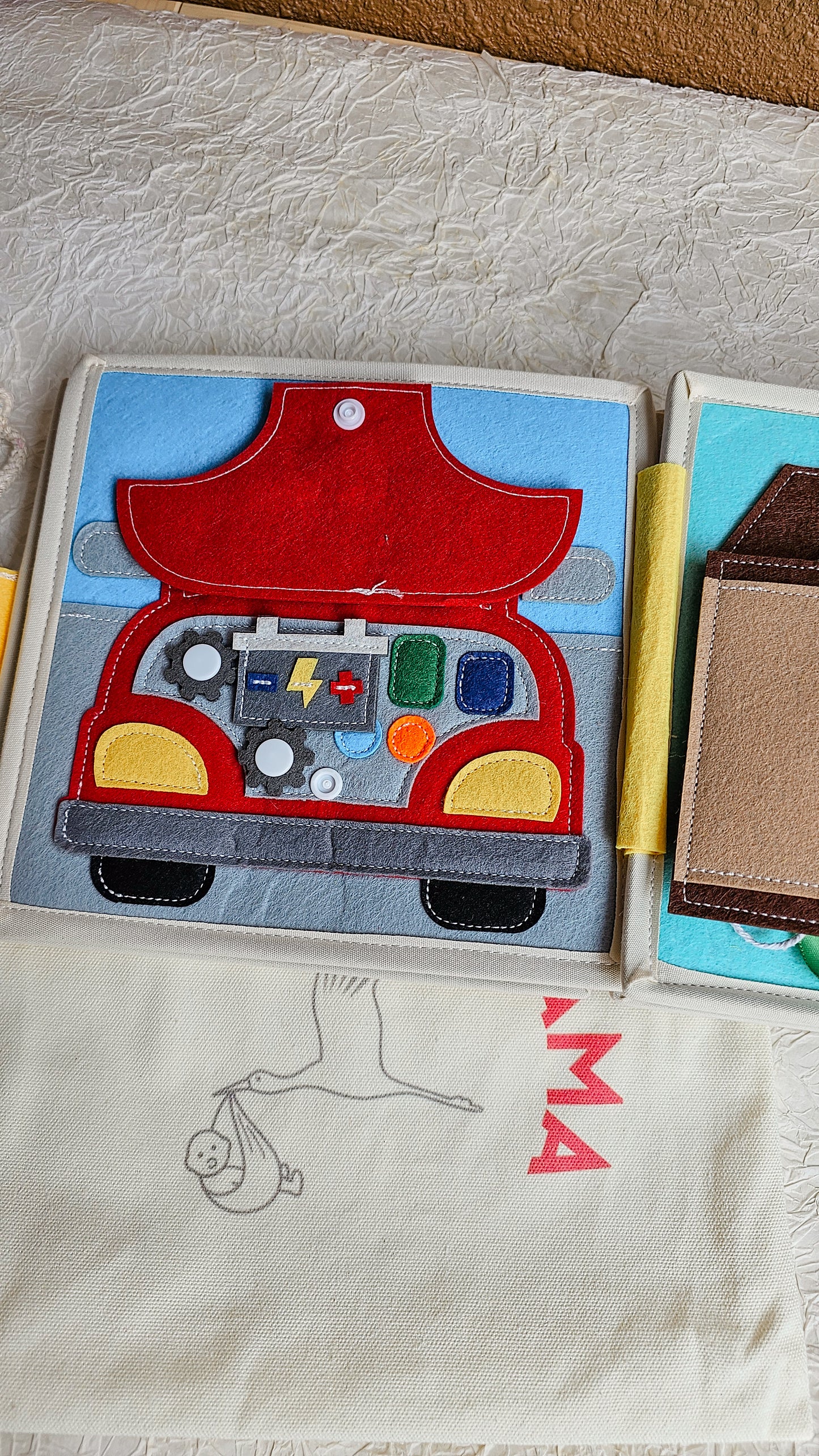 Wheels in Motion Busy Book